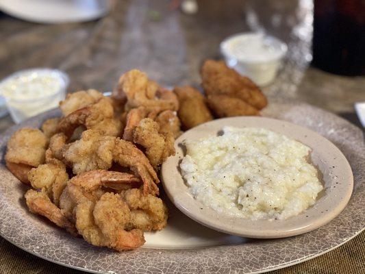 Fried shrimp, grits, and hush puppies.