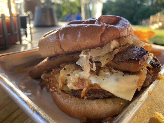 Heidleburger- burger with sauerkraut and brat on top