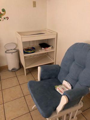 Family bathroom - changing table and nursing area