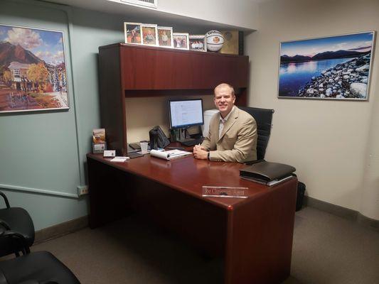 Joe at his office desk in Boulder, CO