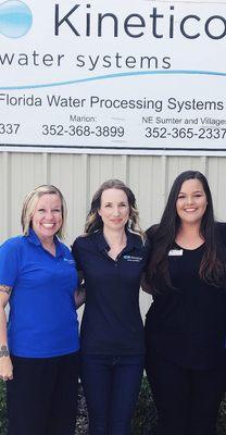 Store front, with some of the office staff.