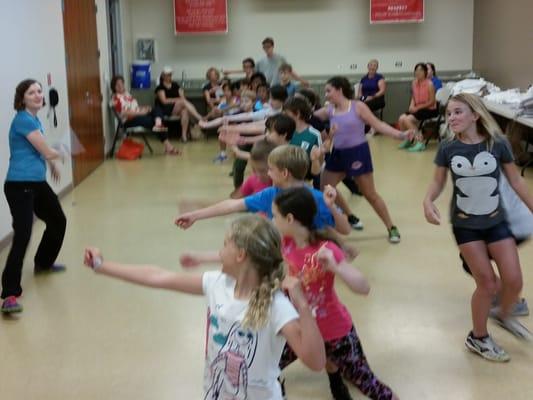 Youth fencers learning the basics