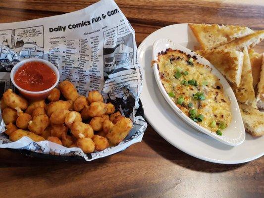 Cheese curds!!! As well as Queso dip with a crostini.