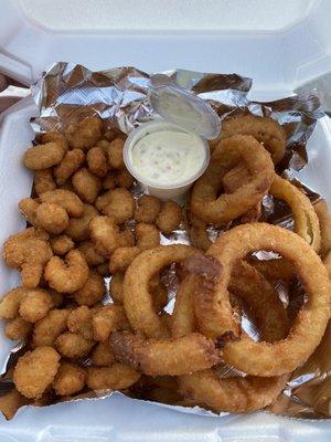 Shrimp basket with tartar sauce and onion as choice. $13.99 as of this review.