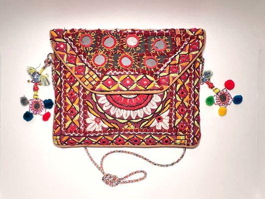 Fun, colorful bags are a great way to add a boho chic vibe to any outfit. Ursipany imports these cotton bags directly from India.