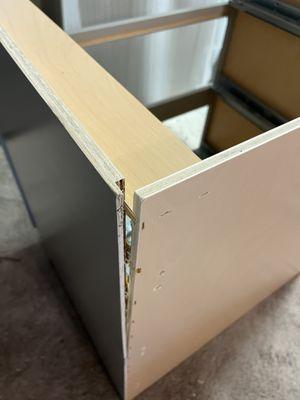 Broken cabinets and wrong drawer sizes.