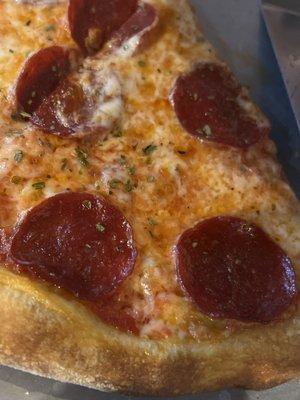 Pepperoni pizza piping hot and delicious