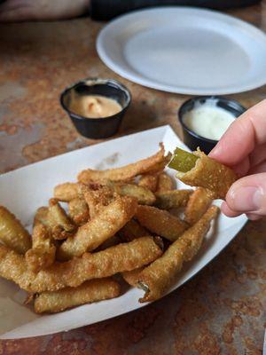 Pickle fries with sabi sauce (orange) and ranch (white)