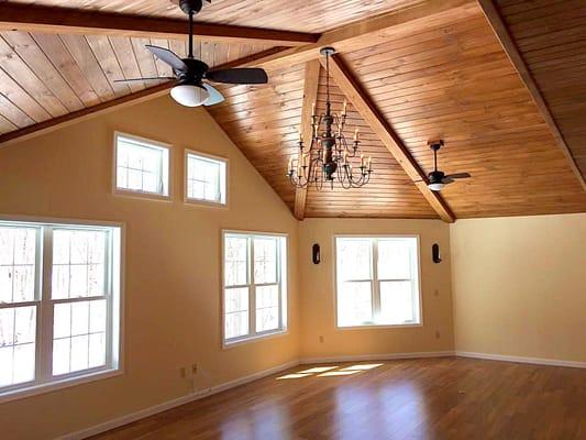 A beautiful 500 square foot great room addition with cathedral ceilings, rustic beams and T&G wood ceilings.