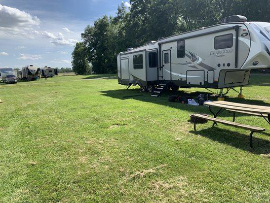 Look how amazing this RV spot is! It has so much yard space!