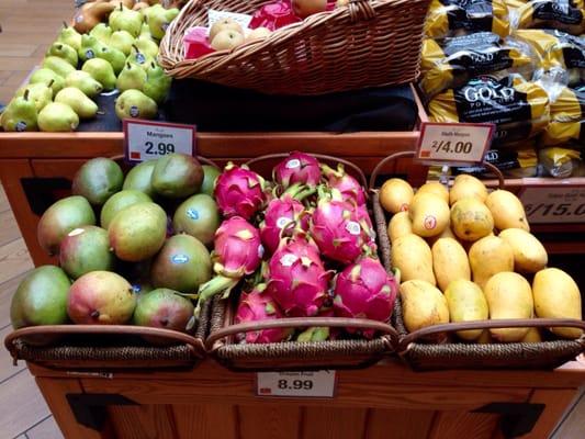 Fresh and pretty dragon fruits, mangoes, Barrett pears, etc.