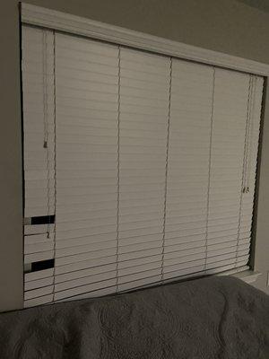 Damaged blinds in 2nd bedroom