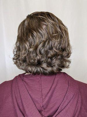 Men's long hair cut. She did a great job in pulling out my natural curls and did a great style. Very clean and efficient.