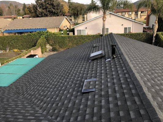 Beautifully installed and set to last a lifetime! Timberline HD Charcoal Shingle with Golden Pledge Warranty.