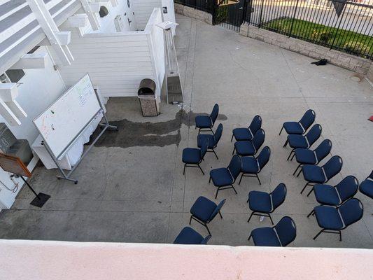 Chairs on the lower level. Must have been for a lecture or a speech