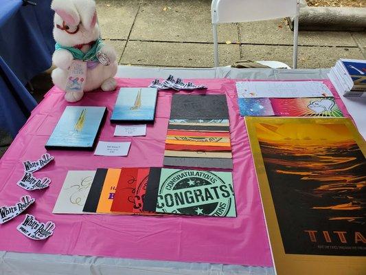 Posters, postcards, notecards, and showcasing a local artist paintings.