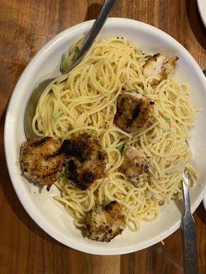 A bowl of wet pasta and six pieces of previously frozen breaded shrimp. $17.95.