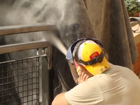 Sandblasting Company Services by Blast-It-Clean offering professional cleaning services for all types of materials.