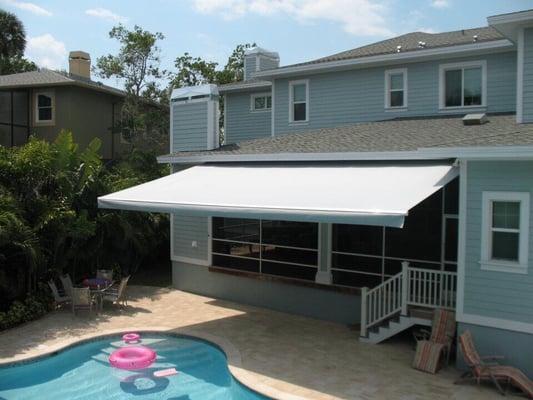 Sunesta retractable awning over pool area in Tampa, FL