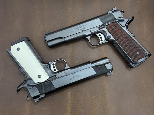 Springfield Professional and Les Baer Custom Carry both done in DLC. Top quality refinishing by Titanium Gun.