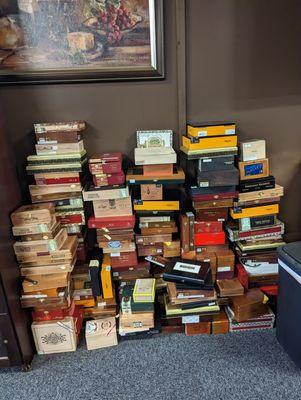 A wide variety of cigar boxes for sale. We are constantly placing empty boxes out front for you to buy. Two dollars a box!