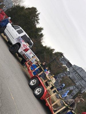 Freedom Tire Guys pulling the Cub Scout Pack 153 float at the Mount Juliet parade.