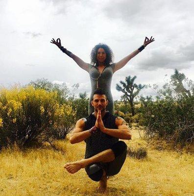 Kamala and Siri striking a pose in Joshua Tree