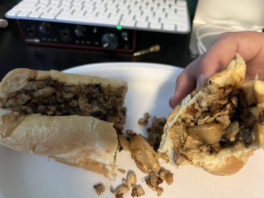 Chicken philly with American cheese, onions and Fried Mushrooms