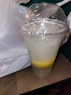 Lemonade with large space-eating germy lemon in it.