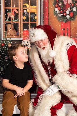 This is a picture of me in my Santa Claus outfit doing a photo session.