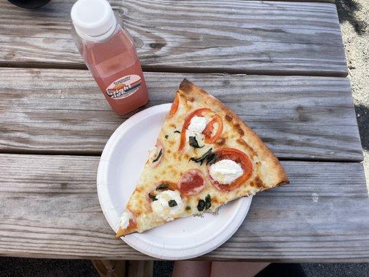 Capri slice with The Bright Side's blueberry lemonade