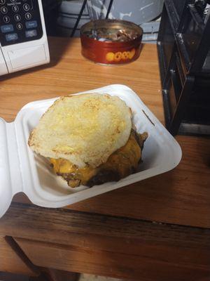 This is a patty melt to them lol a plain bun which is actually two tops and top one is flipped over and has mustard spread on what is top.