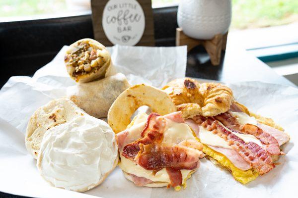 Some breakfast items we serve Monday-Saturday! Breakfast burritos, croissant sandwiches, and breakfast sandwiches.