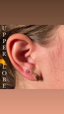 Upper lobe piercing.