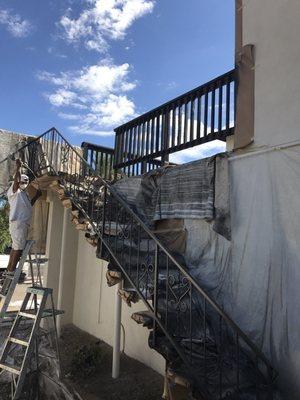 Spruced up railing with fresh paint.