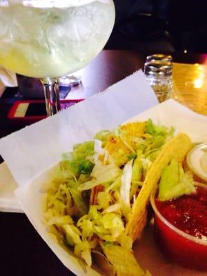 Tacos and margarita happy hour.