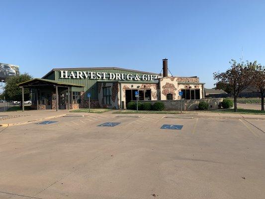 The front of Harvest Drug and Gift with ample parking.