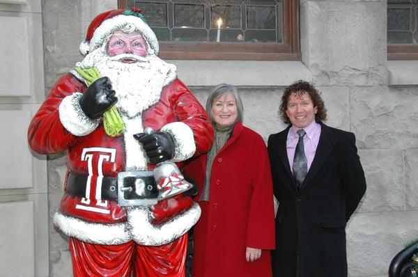 Dr. Roberts with Santa and  his Patient Dr. Ann Hart, President of Temple University