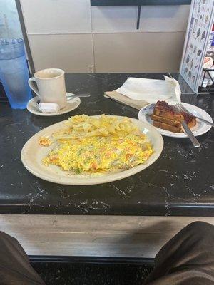 Veg. Omelette and raisin toast