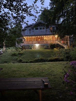 The house lit up at night