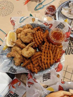 Shrimp basket with sweet potato fries.