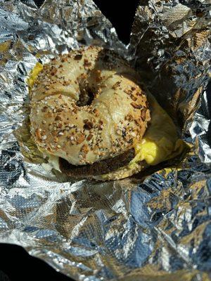 Everything bagel with scrapple, egg and Cheese