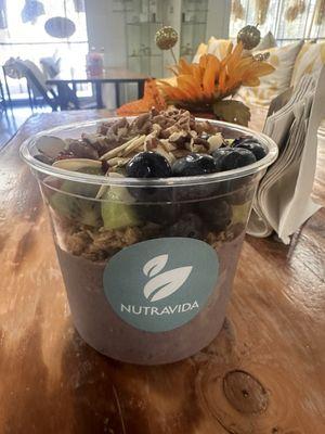 Açaí Bowl with bananas, strawberries, kiwi, walnuts, almonds, and chia seeds