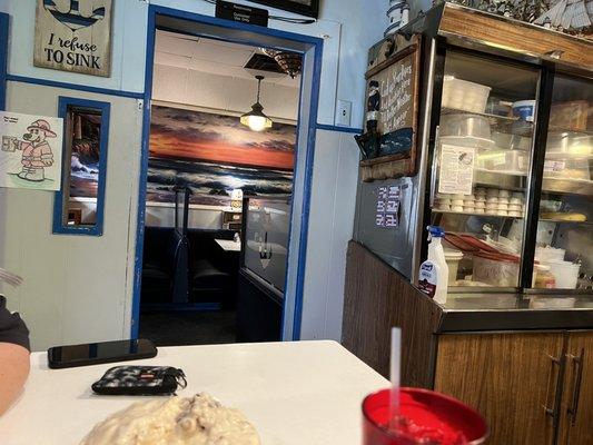 Booths in a separate dining area. Each booth has its own wall juke box!