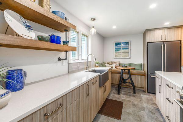 An industrial inspired kitchen featuring rich wood tones and plenty of texture.