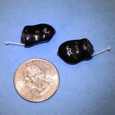 SoundLens Synergy i2400  Premium Wireless Invisible In the Canal hearing aids.  Why are they black? Because they fit deep inside the ear w