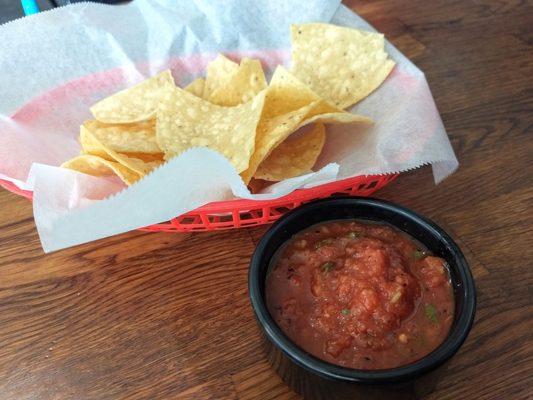 Salsa was fresh and flavorful, but  wish it had more heat. Chips were good and crispy, not greasy. Nice.