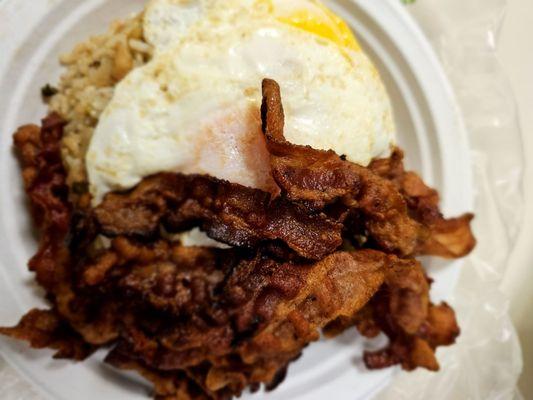 Fried rice plate with meat and eggs