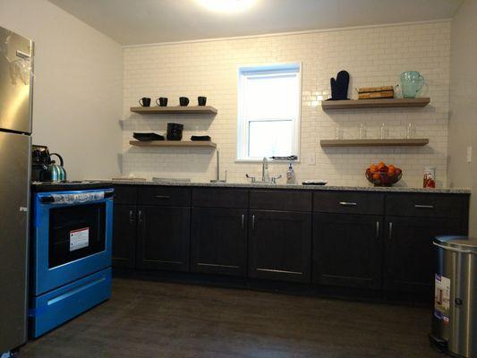 Renovated kitchen in Oswego Apartments on 5th ave