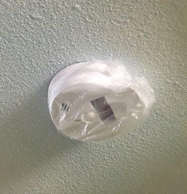 Why is the smoke detector covered in plastic?????